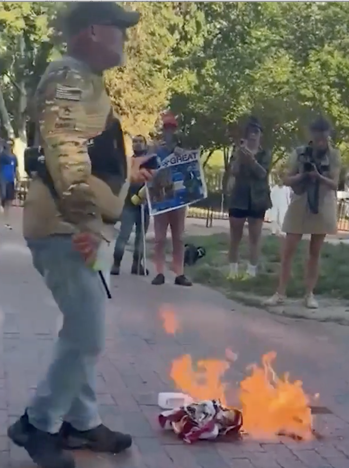 picture of man burning a flag
