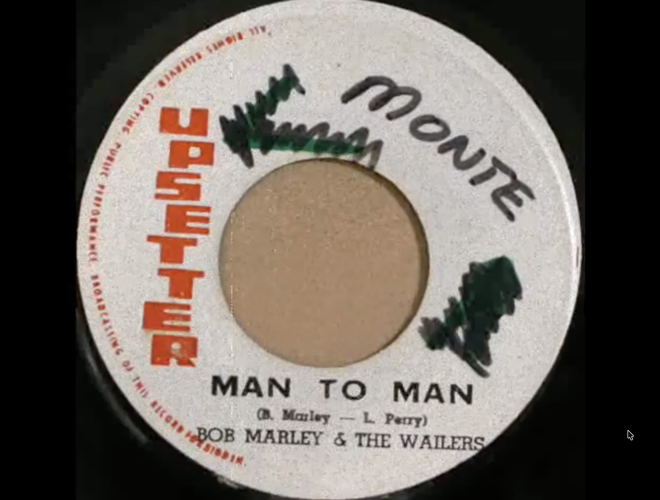 photograph of vinyl audio record of Man To Man by the Wailers, credited to Marley and Perry
