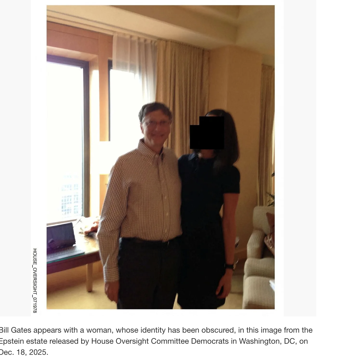 Bill Gates appears with a woman, whose identity has been obscured, in this image from the Epstein estate released by House Oversight Committee Democrats in Washington, DC, on Dec. 18, 2025.